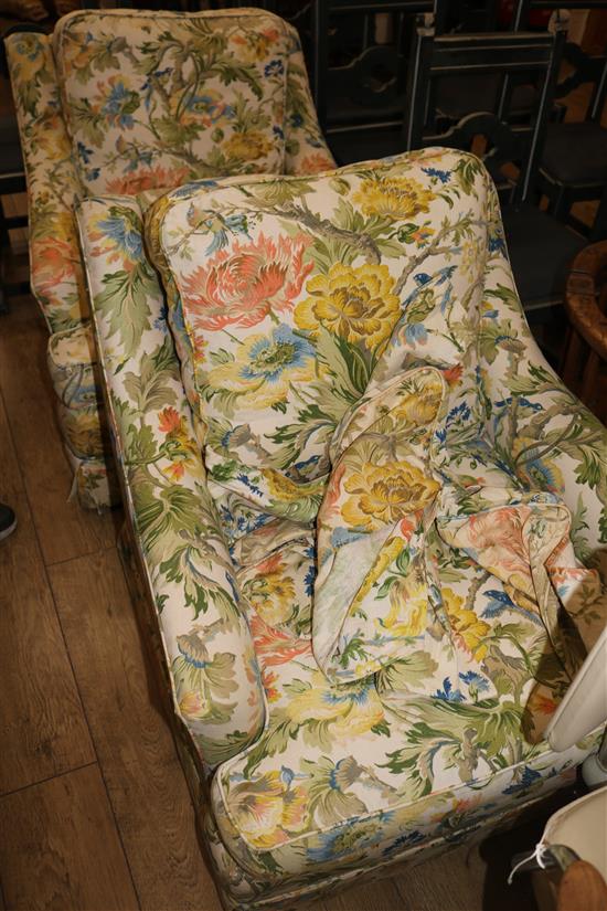 A pair of floral fabric upholstered armchairs